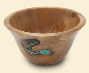 bowl with blue resin decoration